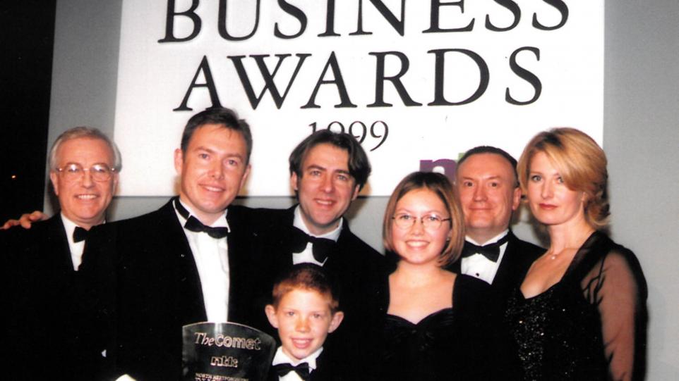 Winning Business Person of the Year from Jonathan Ross in 1999.