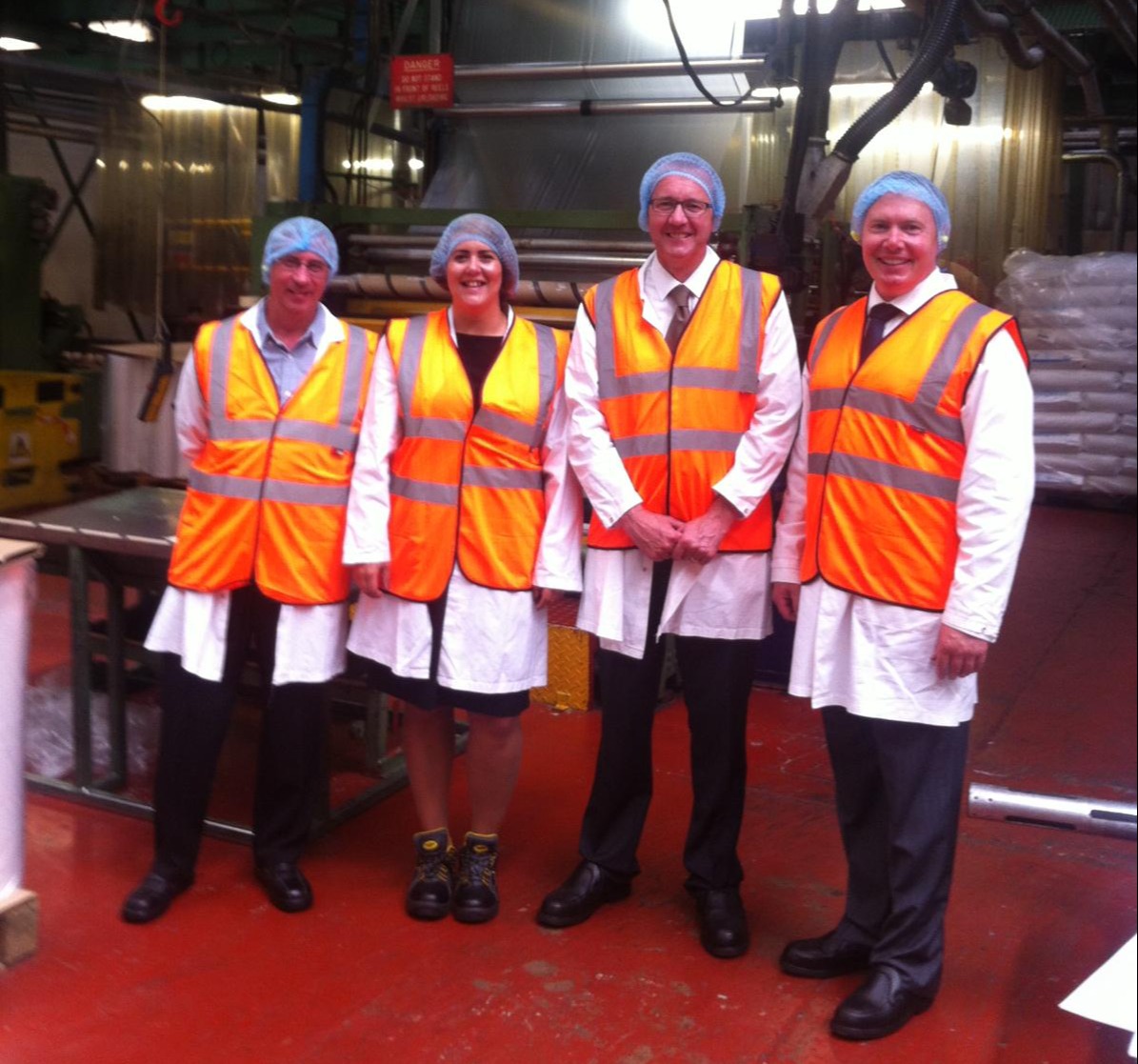 Rob with factory staff